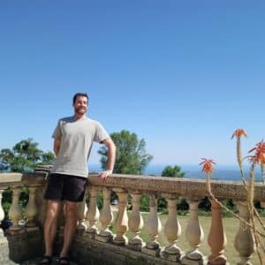Sunny views out toward the Mediterranean coast from the top veranda at Les Courmettes